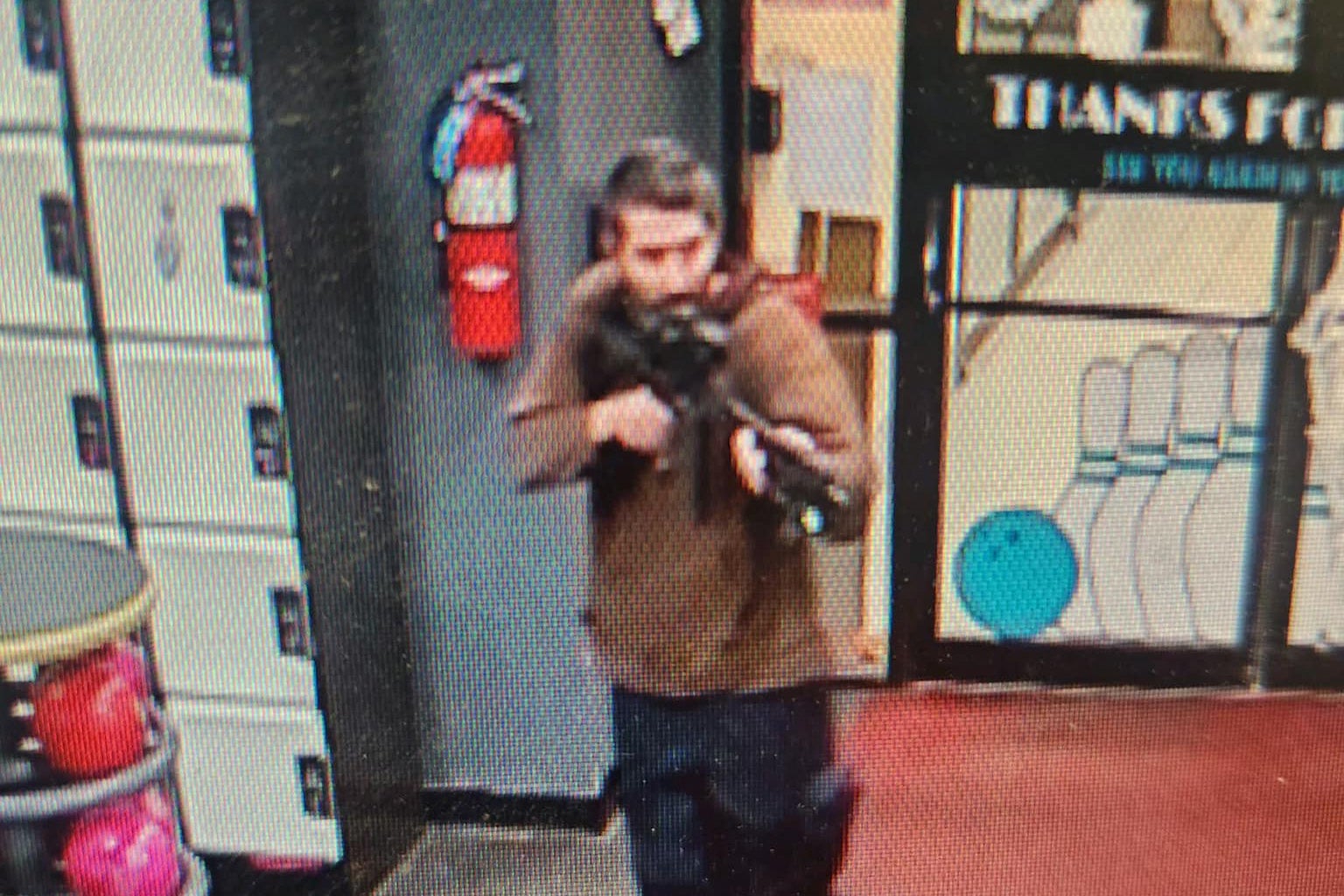 Gunman caught on surveillance footage