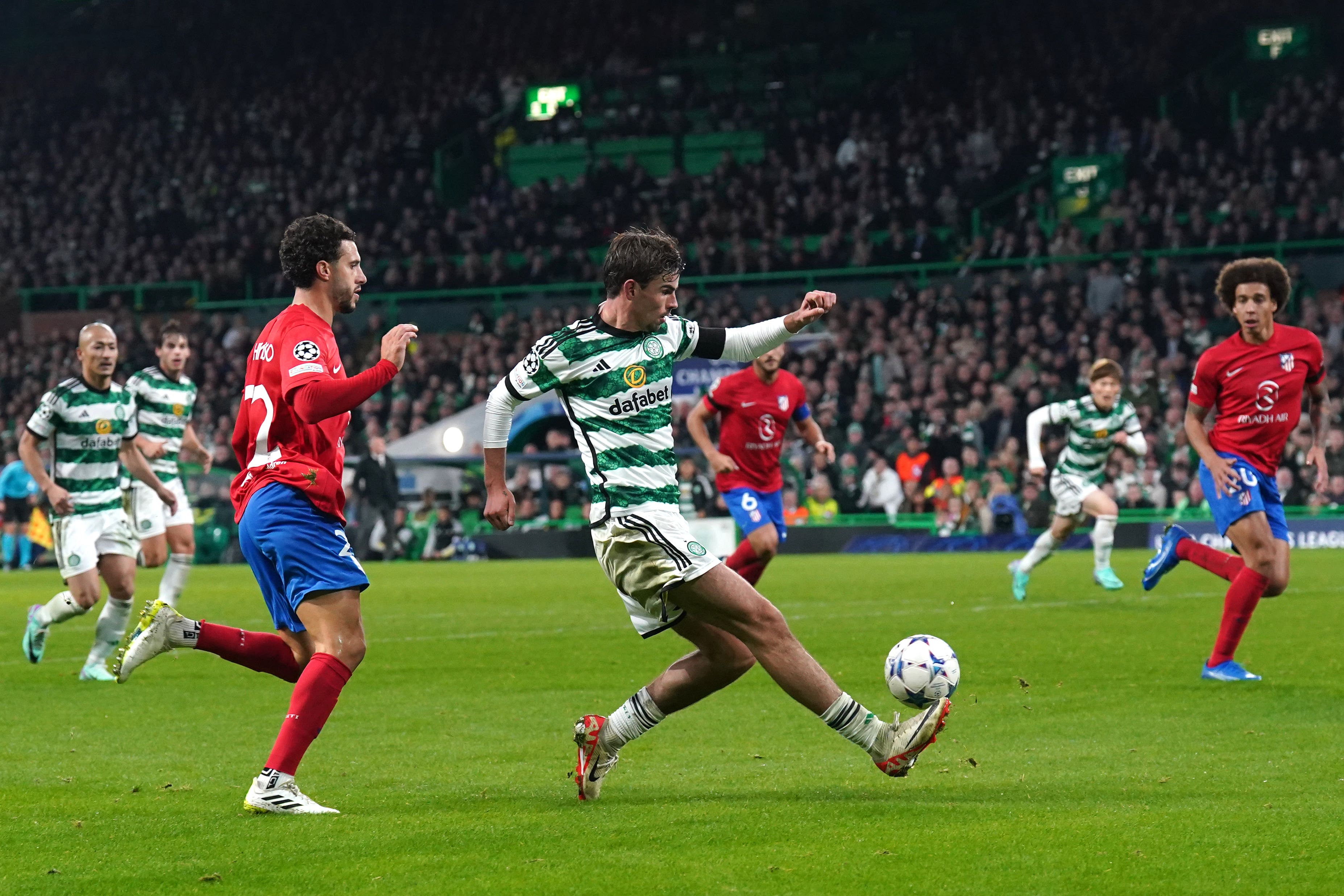 Celtic’s Matt O’Riley in action against Atletico Madrid (Andrew Milligan/PA)