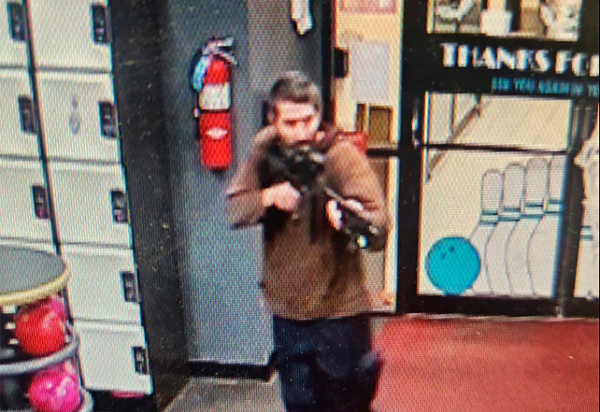 Maine shooting: manhunt continues for suspect Robert Card as 18 confirmed dead