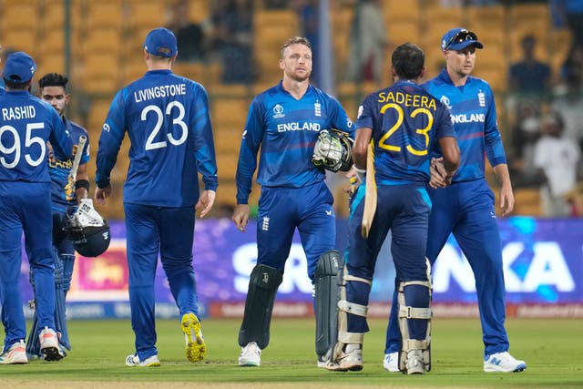 <p>England captain Jos Butler reacts after losing to Sri Lanka by eight wickets at the Cricket World Cup in Bengaluru (Aijaz Rahi/AP)</p>