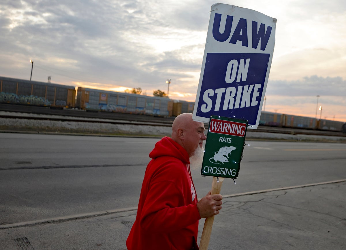 General Motors and Stellantis in talks with United Auto Workers to reach deals that mirror Ford's