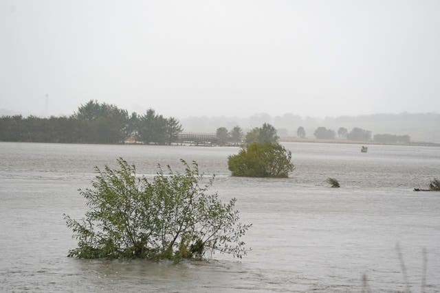 The River Don in Kintore as Storm Babet batters the country (PA)