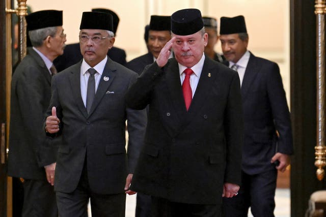 <p>Sultan Ibrahim Iskandar of Johor (right, saluting) with Malaysia’s King Sultan Abdullah Sultan Ahmad Shah, after Friday’s summit </p>