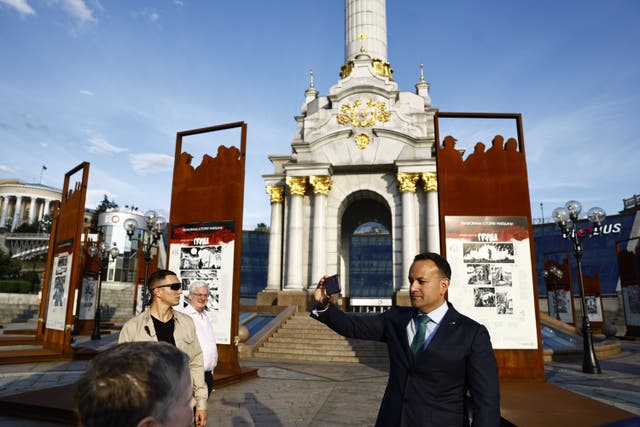 Taoiseach Leo Varadkar visits the memorial to the Heavenly Hundred at Maidan Square, following a meeting with Ukraine’s President Volodymyr Zelensky, in Kyiv, Ukraine (PA)