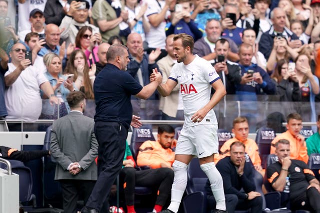 Harry Kane with Tottenham head coach Ange Postecoglou during the Shakhtar Donetsk friendly (Yui Mok/PA)