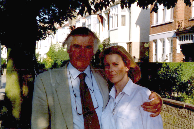 <p>In this exclusive family photo, Frieda stands embraced by her father, Ted Hughes
</p>