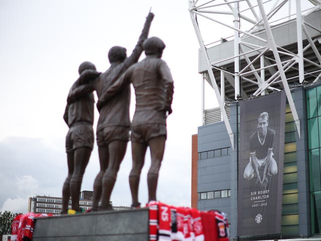 <p>Tributes left to Sir Bobby Charlton outside the Old Trafford stadium</p>