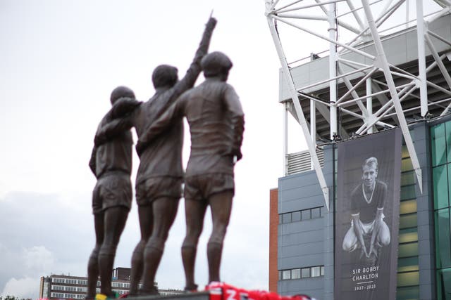 <p>Tributes left to Sir Bobby Charlton outside the Old Trafford stadium</p>