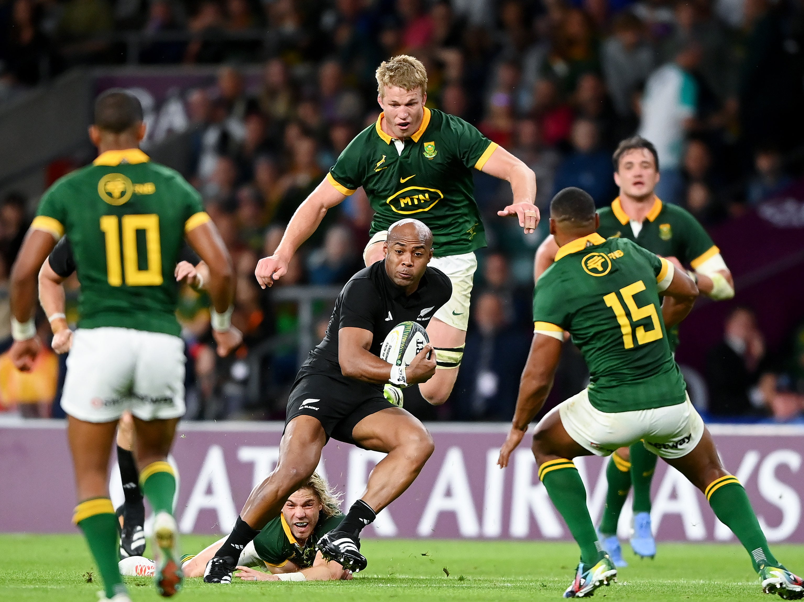 Mark Telea of New Zealand breaks through South Africa in the last meeting between the sides in August at Twickenham