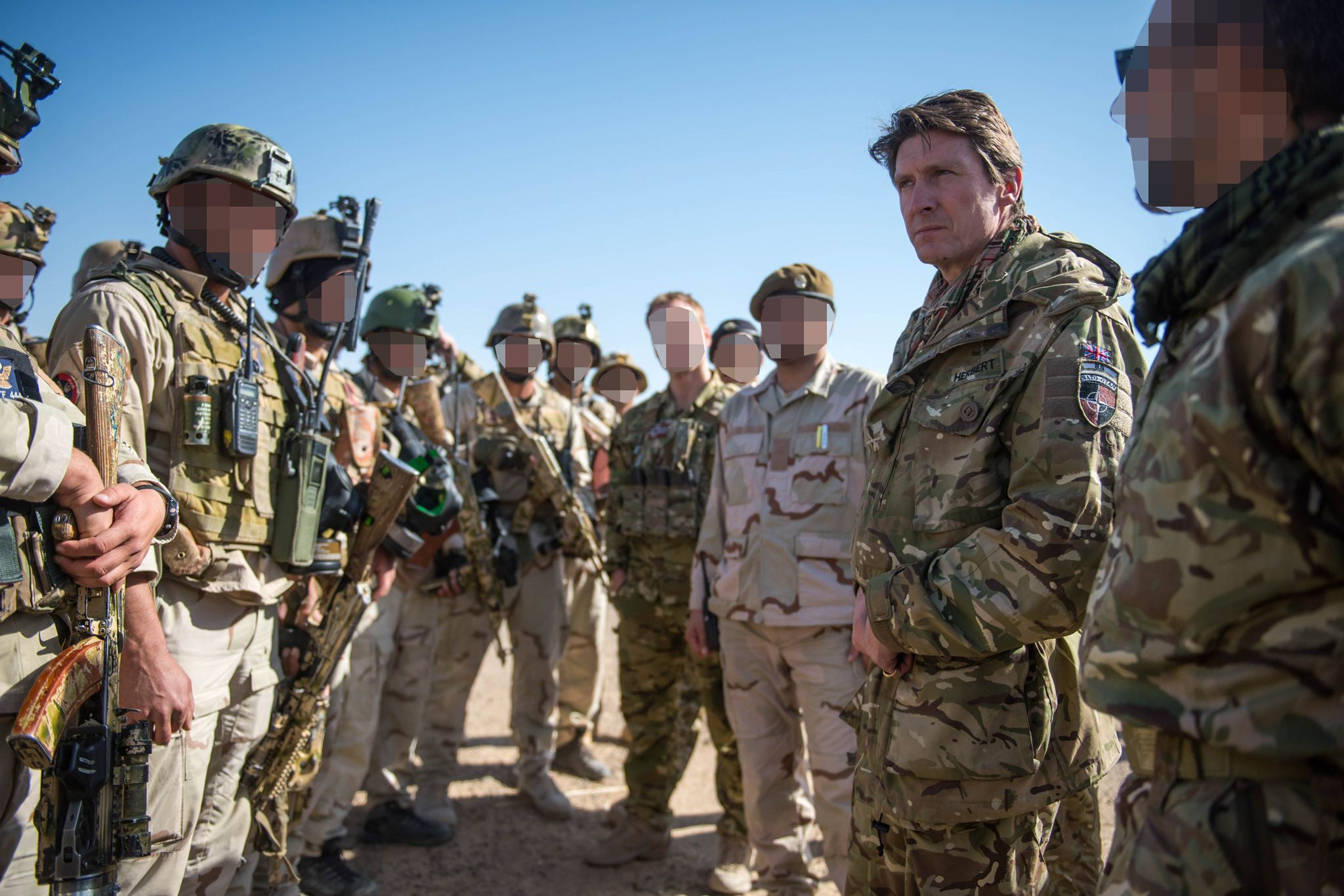 Major General Charlie Herbert (second from right), former senior Nato adviser in Afghanistan, with 444 members in Kandahar in 2018