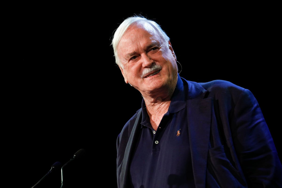 John Cleese apologises for ‘very bad joke’ comparing Donald Trump to Hitler
