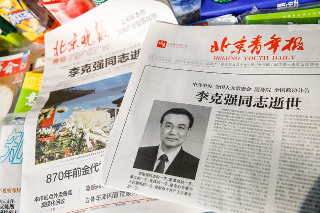 <p>A newspaper front page shows former Chinese leader Li Keqiang’s obituary at a newsstand in Beijing</p>