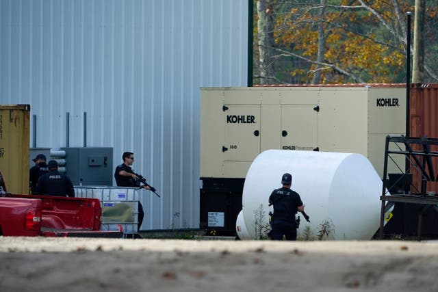 <p>Law enforcement search a farm for the suspect in this week's deadly mass shootings, Friday, Oct. 27, 2023, in Lisbon, Maine</p>