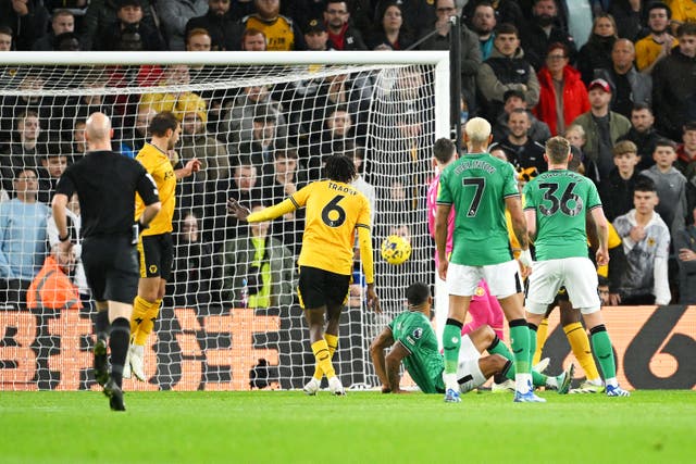 <p>Callum Wilson watches the ball hit the net to give Newcastle the lead</p>