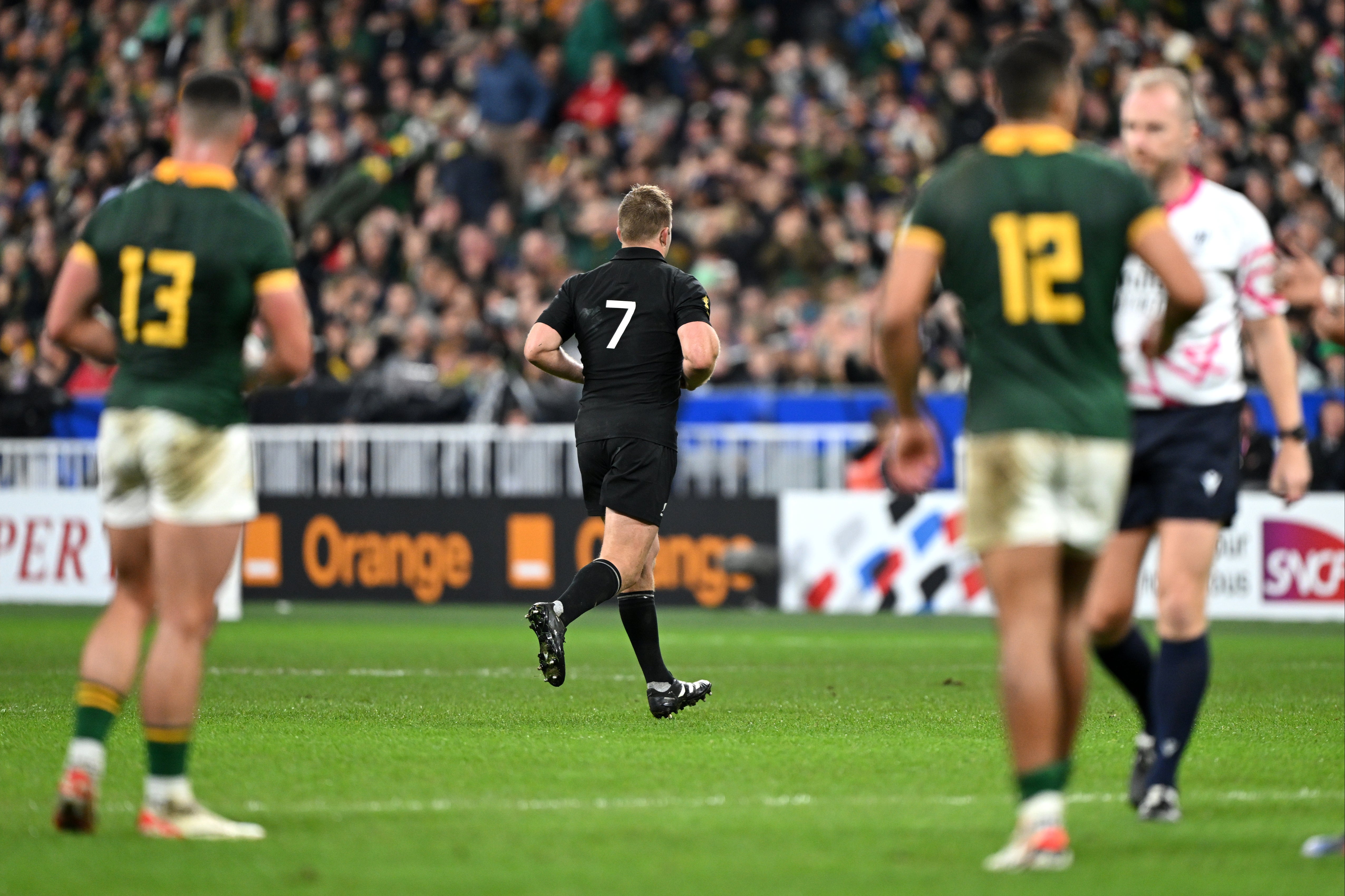 Sam Cane runs off to the sin-bin after his dangerous tackle