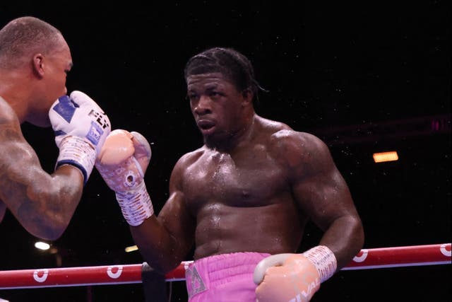 <p>Fabio Wardley in action with David Adeleye during their heavyweight fight</p>