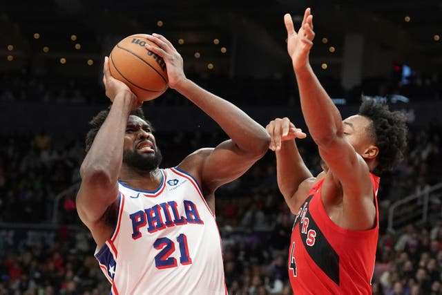 Philadelphia 76ers’ Joel Embiid looks to shoot against Toronto Raptors’ Scottie Barnes (Chris Young/The Canadian Press via AP)