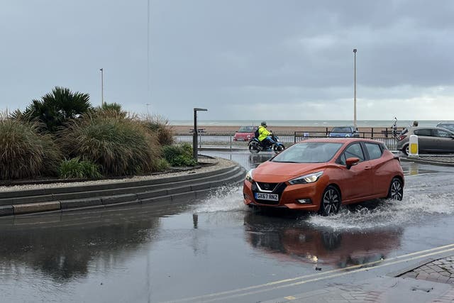 Flooding hit Hastings in Sussex following torrential rain (@GraemeDavis/PA)