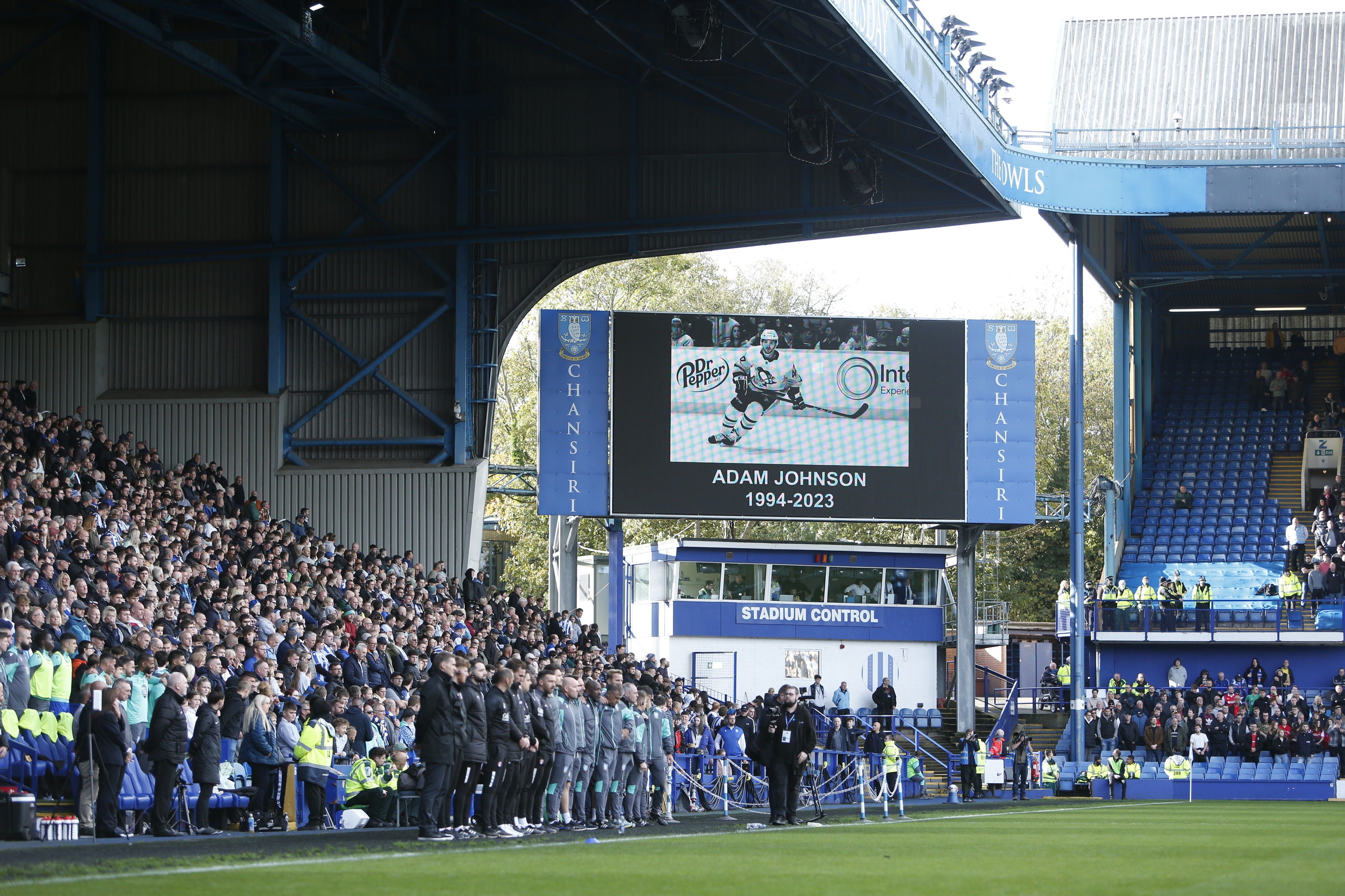 Players and staff observe a minute silence in memory of Adam Johnson ahead of the Sky Bet Championship match at Hillsborough
