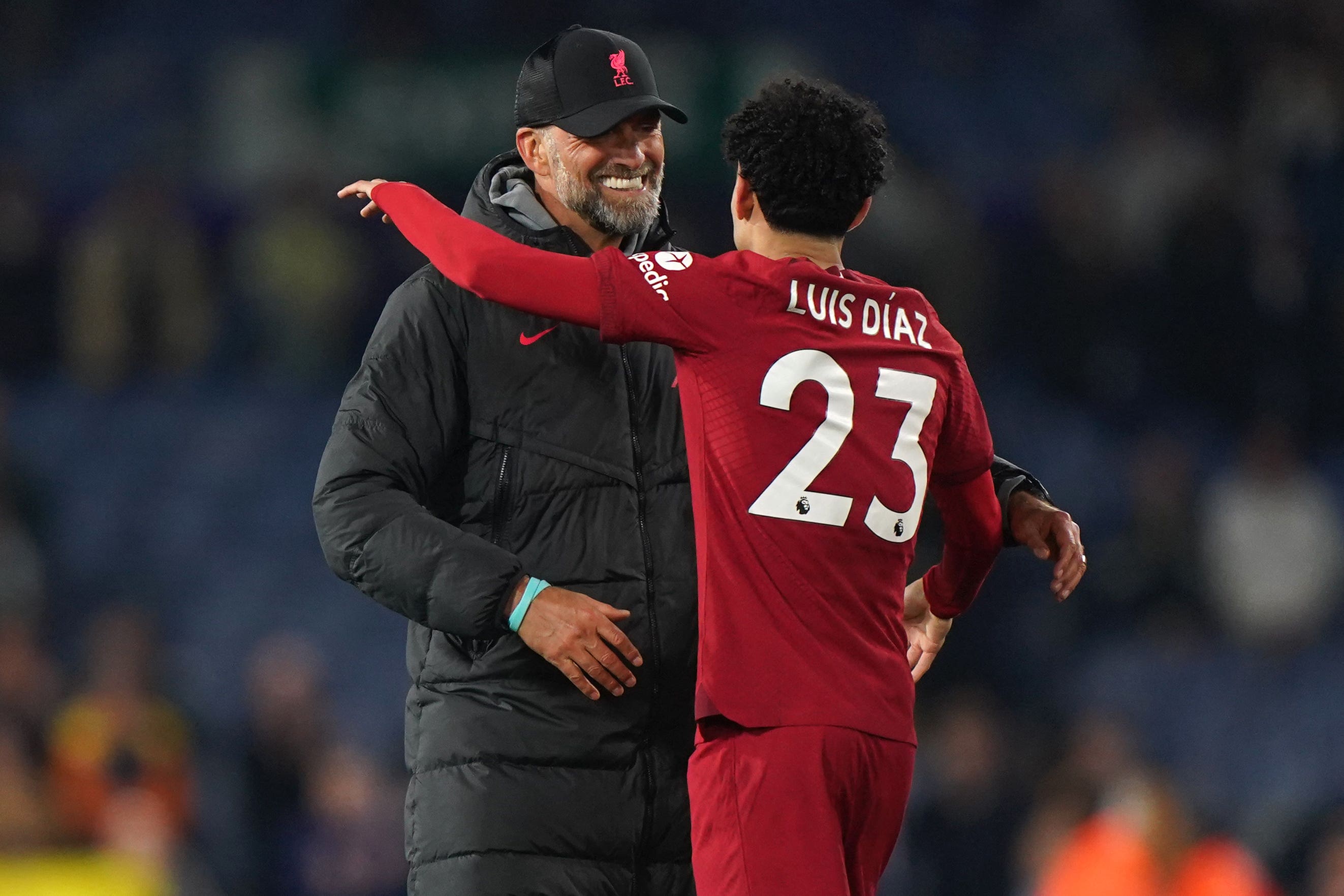 Liverpool manager Jurgen Klopp embraces Diaz