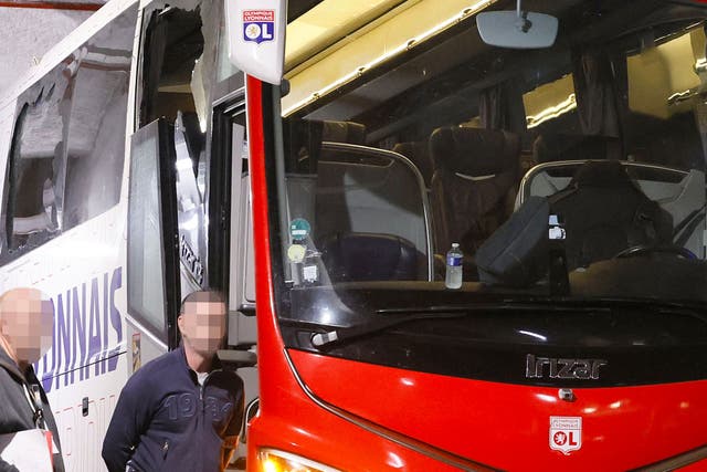 <p>Lyon’s bus was damaged after arriving at Stade Velodrome </p>