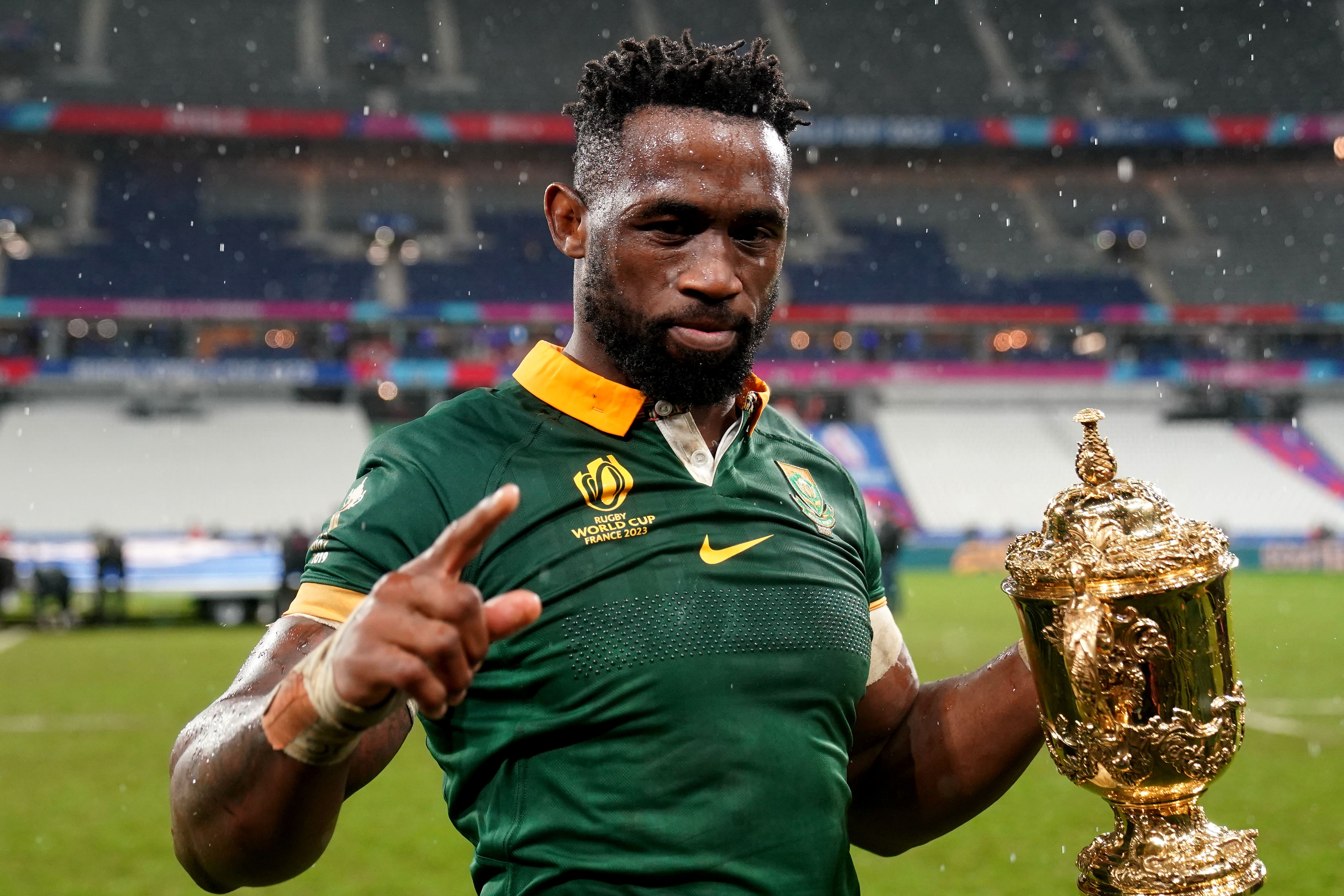 South Africa’s Siya Kolisi celebrates with the Webb Ellis Cup after his side’s victory over New Zealand in the World Cup final in Paris (David Davies/PA)