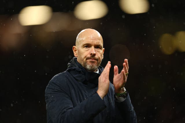 <p>Erik Ten Hag applauds the Manchester United fans</p>