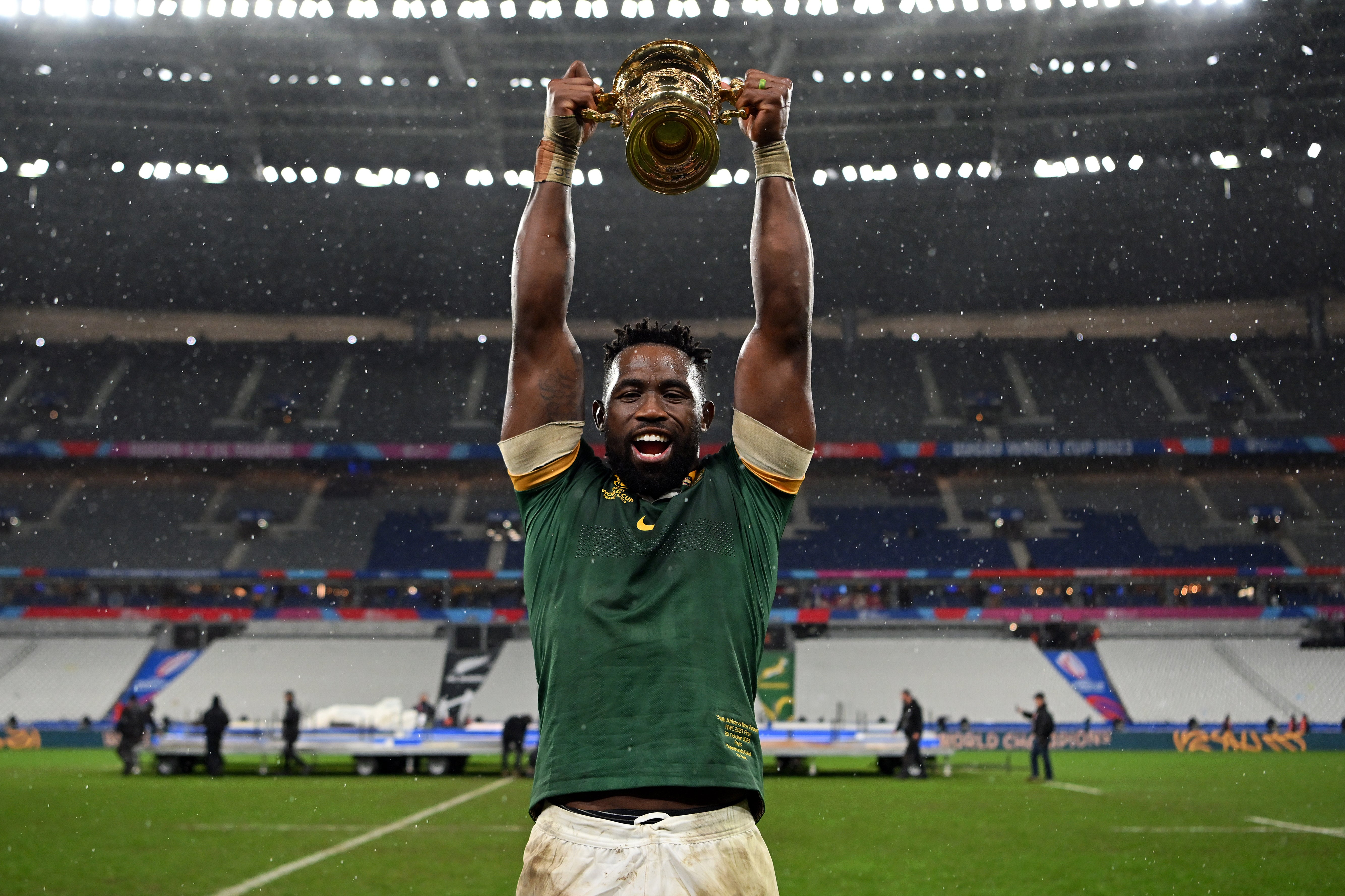 Siya Kolisi of South Africa celebrates with the The Webb Ellis Cup following his side's victory in the Rugby World Cup France 2023