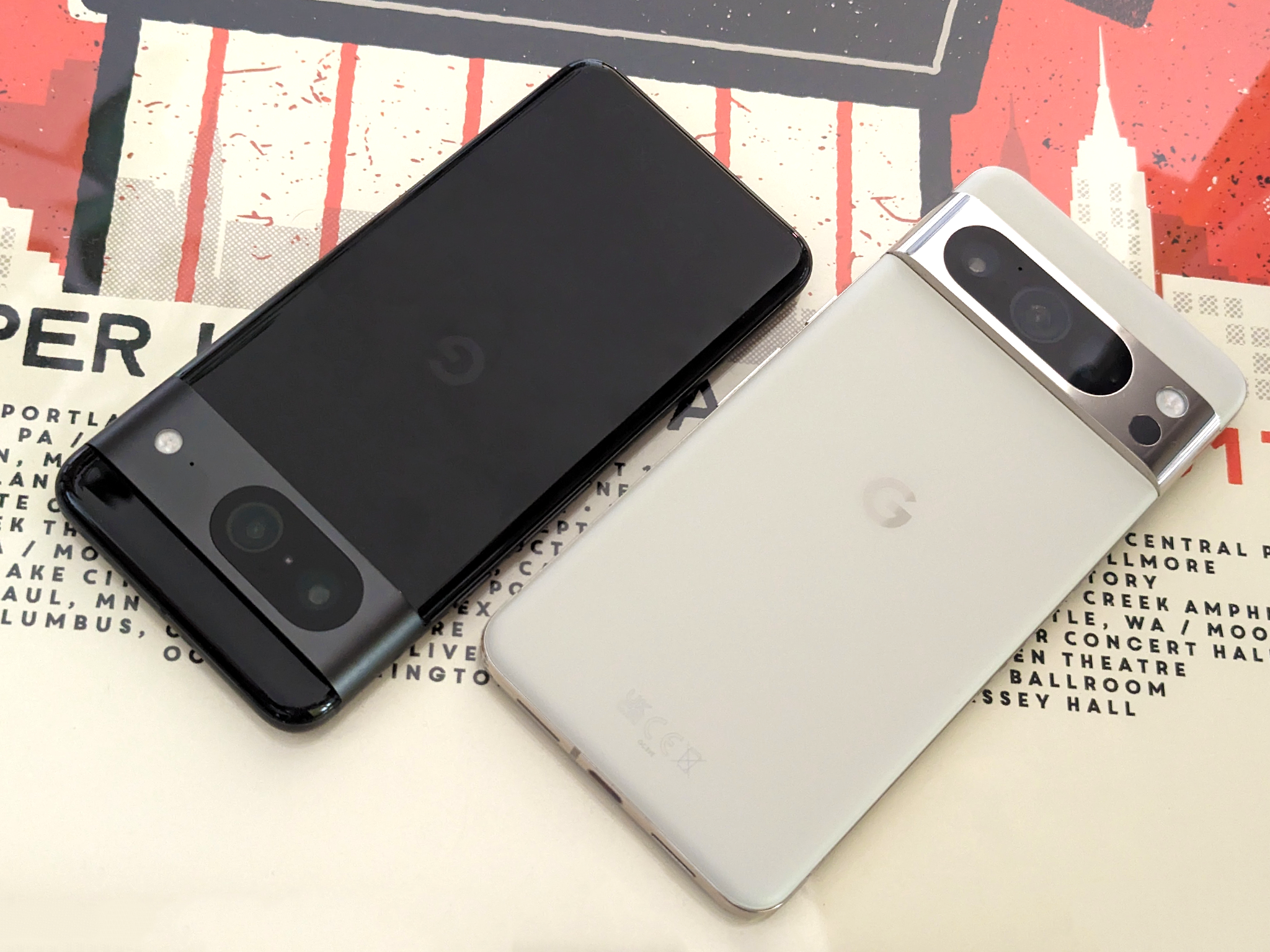 The Pixel 8 in black and the Pixel 8 Pro in white