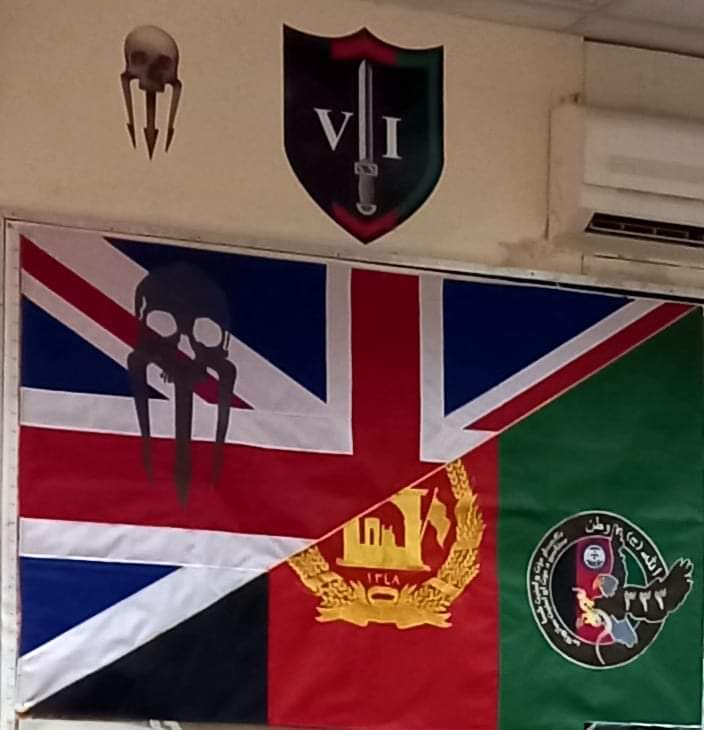 A picture of a union jack and an Afghan flag sewn together and hung in the British mentors’ mess hall at the CF333 base in Logar province