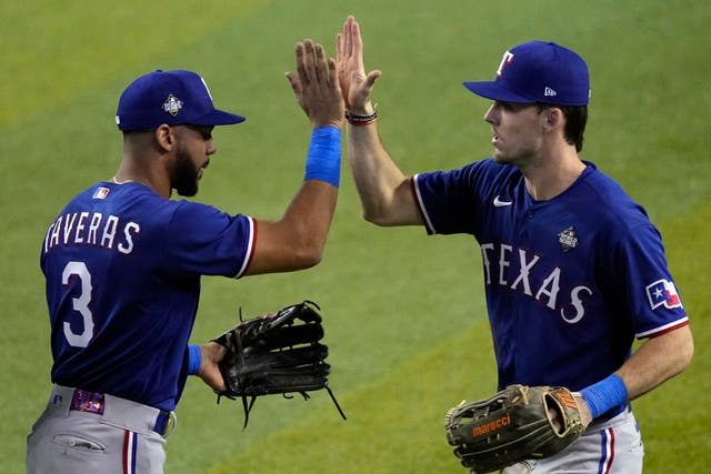 Texas Rangers’ Leody Taveras (3) and Evan Carter celebrate victory (Ross D Franklin/AP)