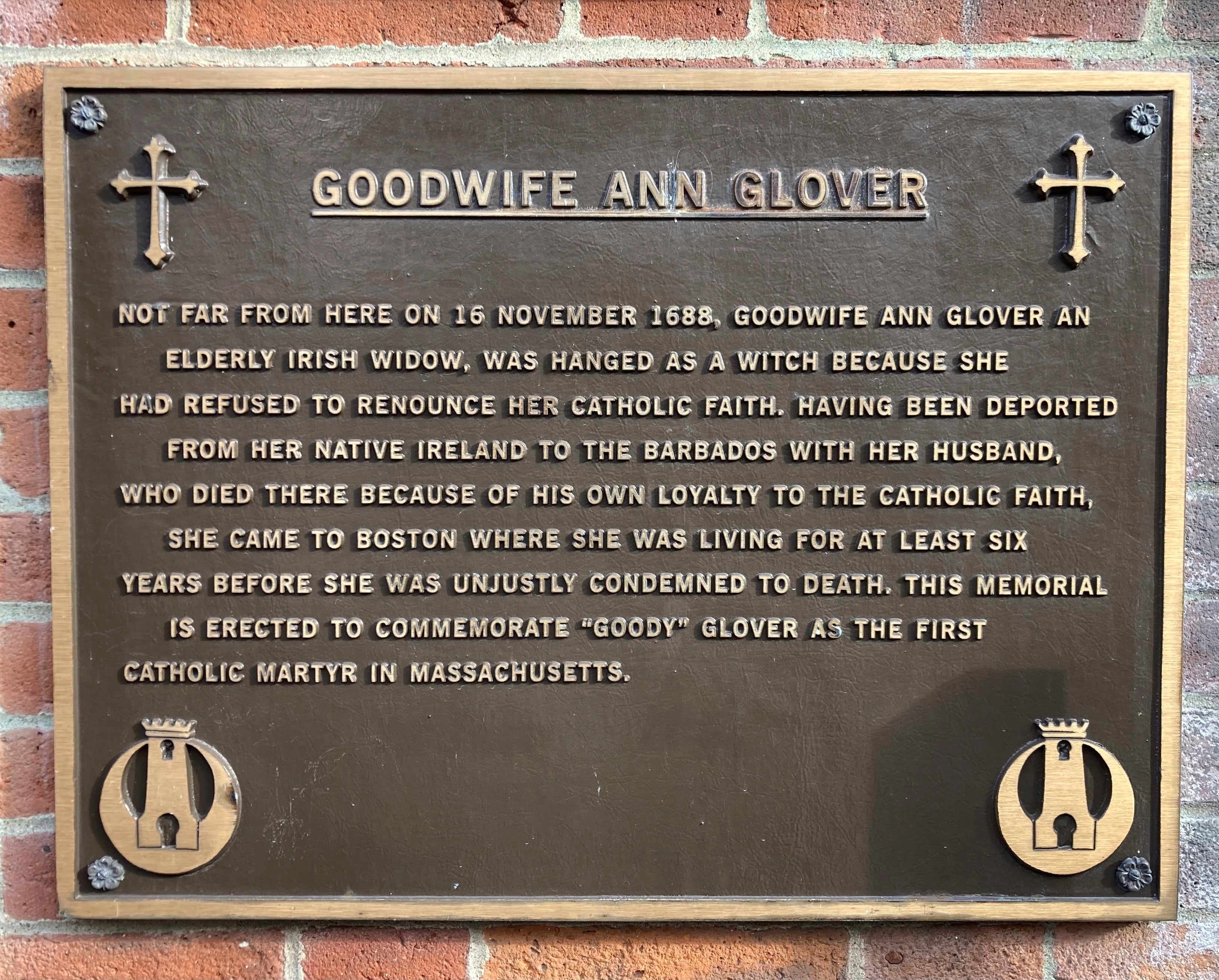 A plaque memorializing Goodwife Ann Glover or Goody Glover, hanged as a witch in Boston in 1688, is located on the front of a Catholic church in the city's North End neighborhood