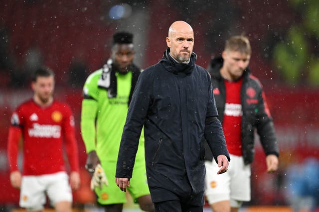 <p>Erik ten Hag leaves the field after Manchester United’s defeat by City</p>