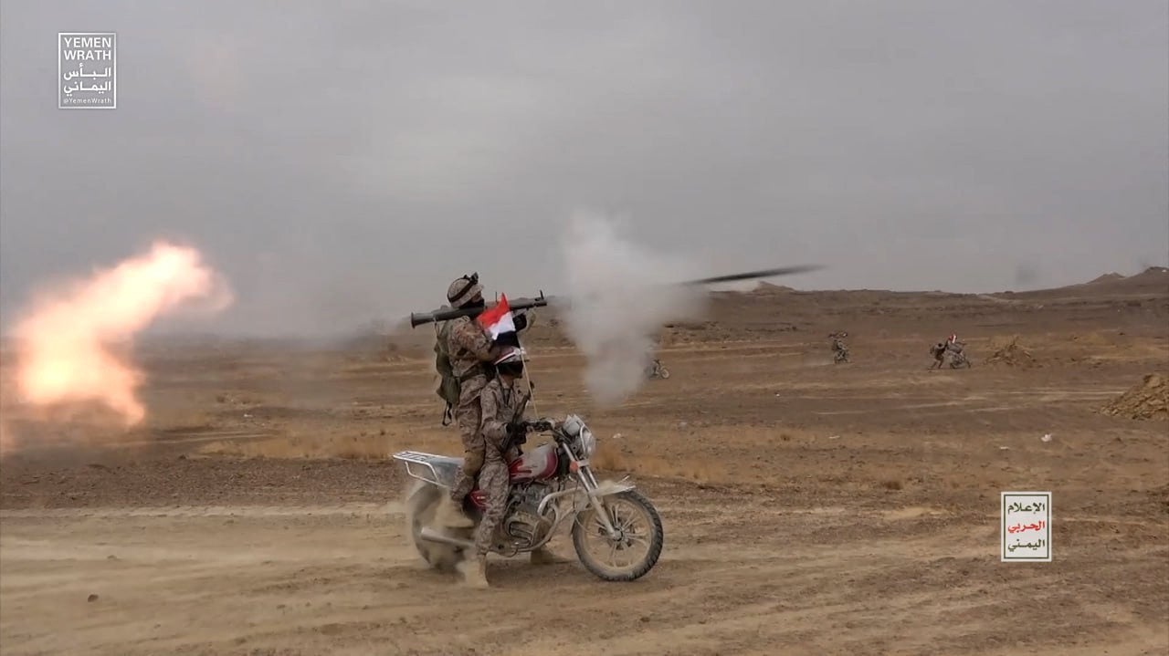 A Houthi fighter fires an RPG grenade during a military manoeuvre near Sanaa, Yemen. The Houthis are among the regional groups that Iran supports in the Middle East