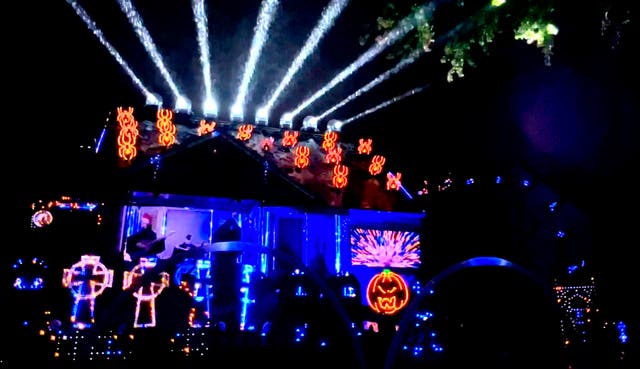 <p>Couple spend £24k to turn their house into a spooky Halloween light show</p>