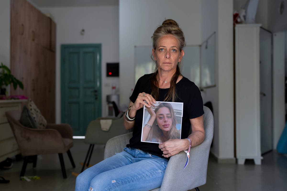 AP PHOTOS: Israeli families of hostages taken to Gaza caught between grief and hope as war rages on