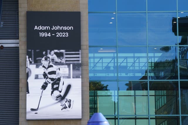 A message board with a tribute to Nottingham Panthers’ ice hockey player Adam Johnson outside the Motorpoint Arena in Nottingham, the home of the Panthers. Mr Johnson died after an accident during a Challenge Cup match with Sheffield Steelers on Saturday night. Picture date: Monday October 30, 2023.