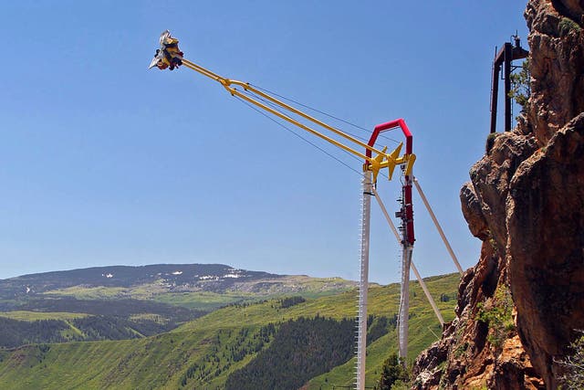 <p>People ride the Giant Canyon Swing at Glenwood Caverns Adventure Park in Glenwood Springs, Colo., June 10, 2011.</p>