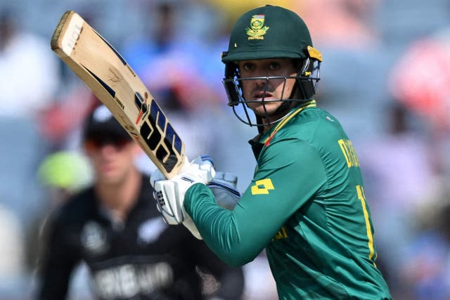 <p>South Africa's Quinton de Kock watches the ball after playing a shot</p>
