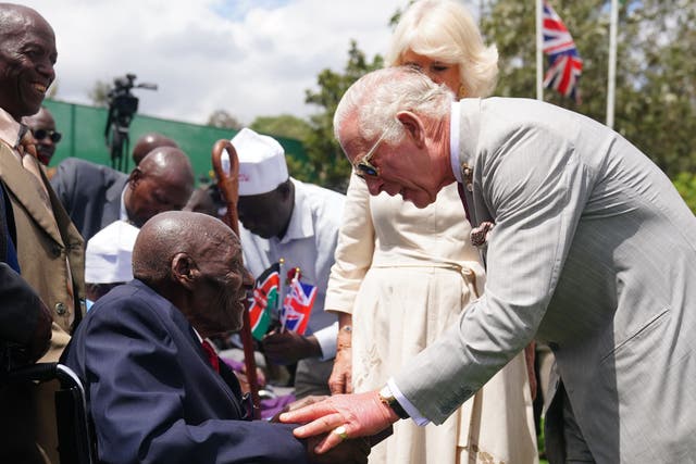 The King meets veteran Samwel Nthigai Mburia, who is believed to be 117 years old, during a visit the Commonwealth War Graves Commission cemetery in Nairobi on day two of the state visit to Kenya (Victoria Jones/PA)