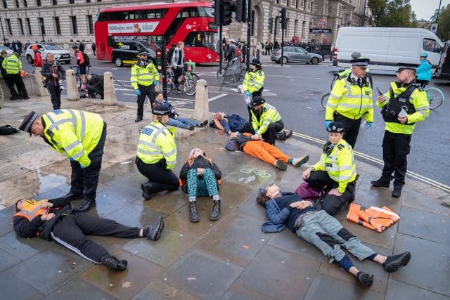 Just Stop Oil protesters in Parliament Square on Monday (Stefan Rousseau/PA)