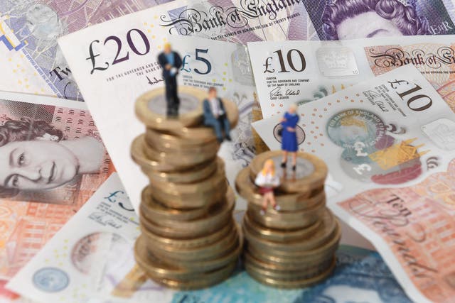 The gender pay gap for full-time workers has barely changed over the past year, new figures suggest (Joe Giddens/PA)