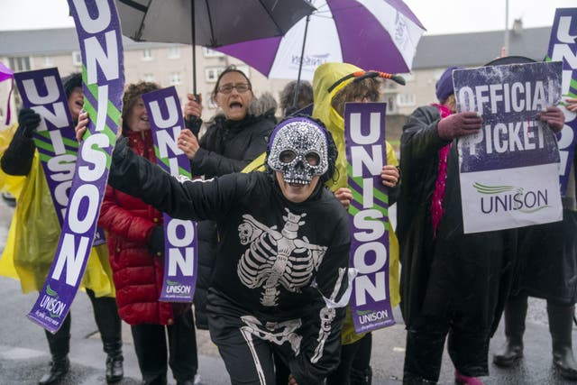 School support staff are on strike at four local authorities in Scotland, closing hundreds of schools (Jane Barlow/PA)