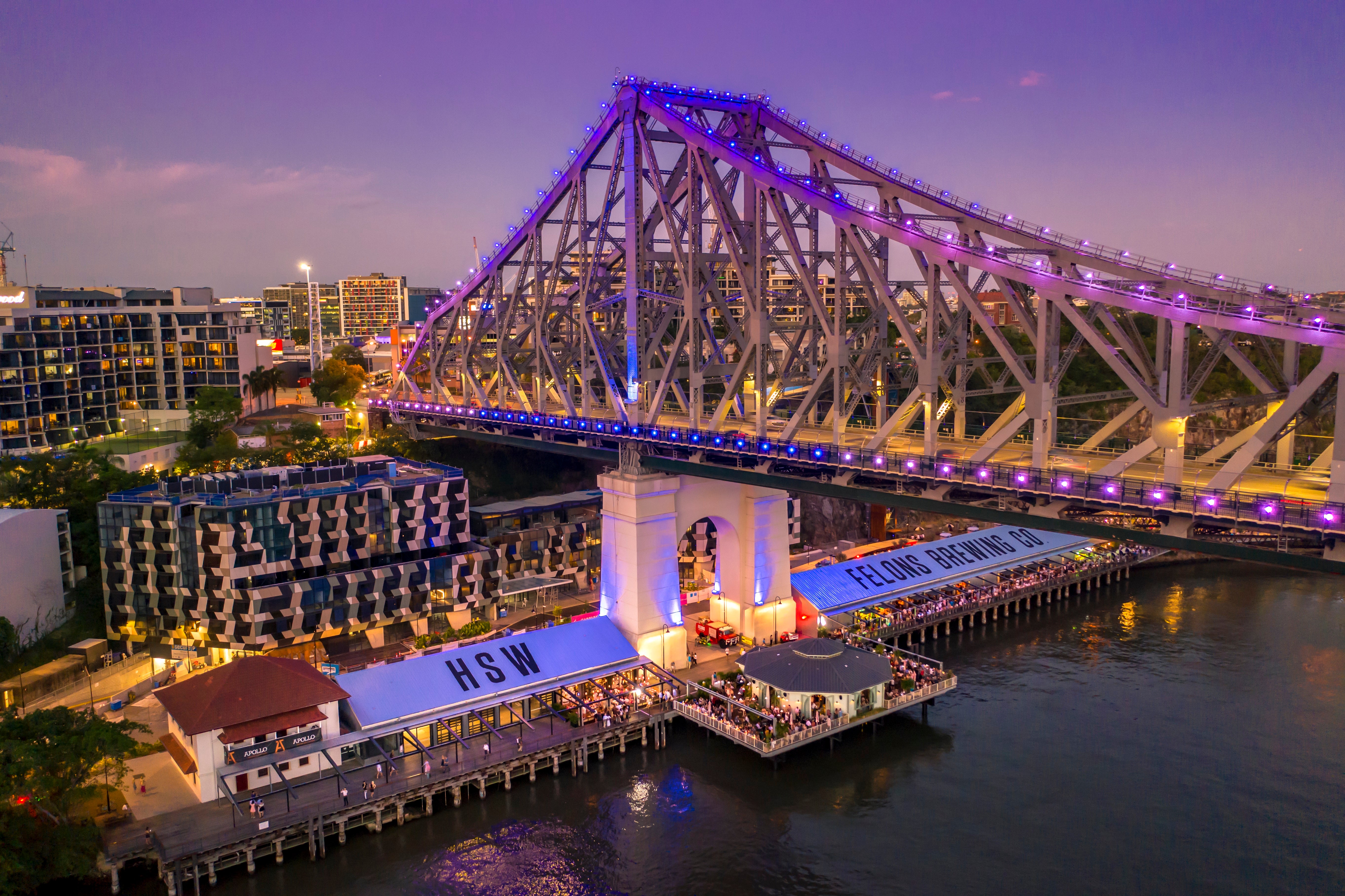 Howard Smith Wharves, located on a once-neglected piece of land, has been transformed into a bustling pedestrian boardwalk lined with restaurants, bars, hotels, and event spaces