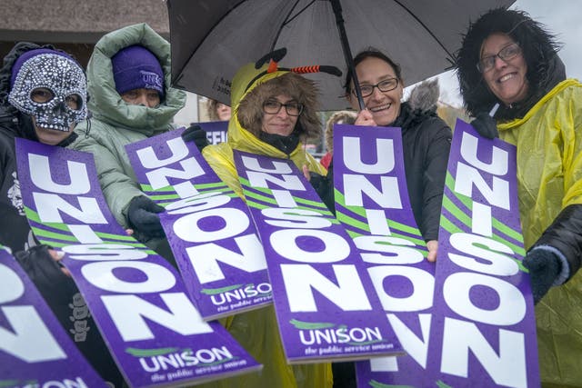School support staff are taking strike action in four areas of Scotland, with further walkouts planned over the coming weeks (Jane Barlow/PA)