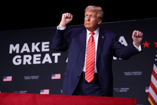 <p>Former U.S. President and current Republican presidential candidate Donald Trump dances after speaking during a campaign rally in Sioux City, Iowa, U.S. October 29, 2023</p>