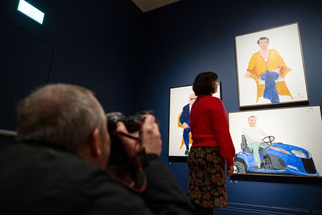 <p>A painting of pop star Harry Styles by David Hockney has gone on display at the National Portrait Gallery as part of a new exhibition dedicated to the artist (Jordan Pettitt/PA)</p>