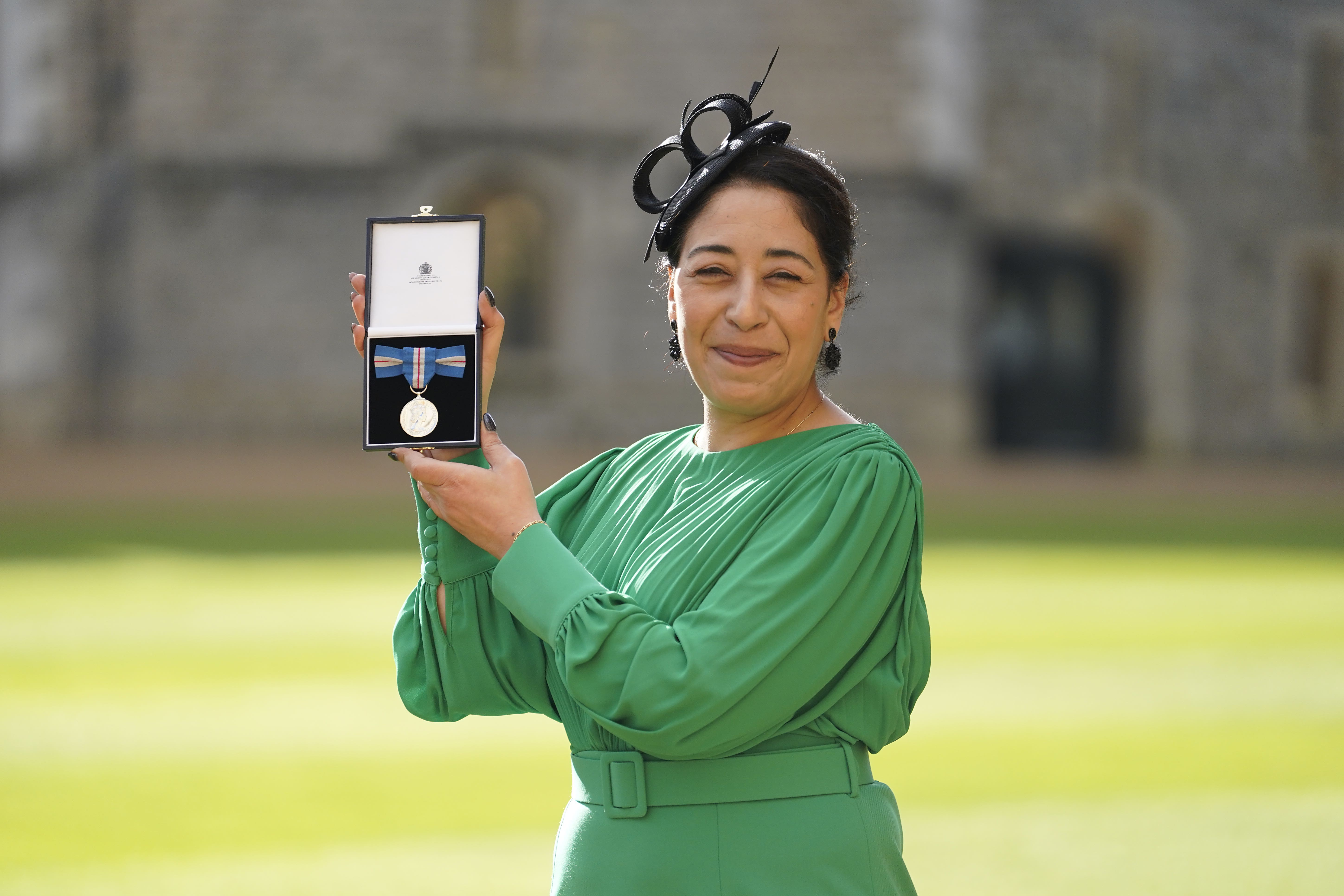 Ayette Bounouri was decorated with the Queen’s Gallantry Medal by the Prince of Wales at Windsor Castle (Andrew Matthews/PA)