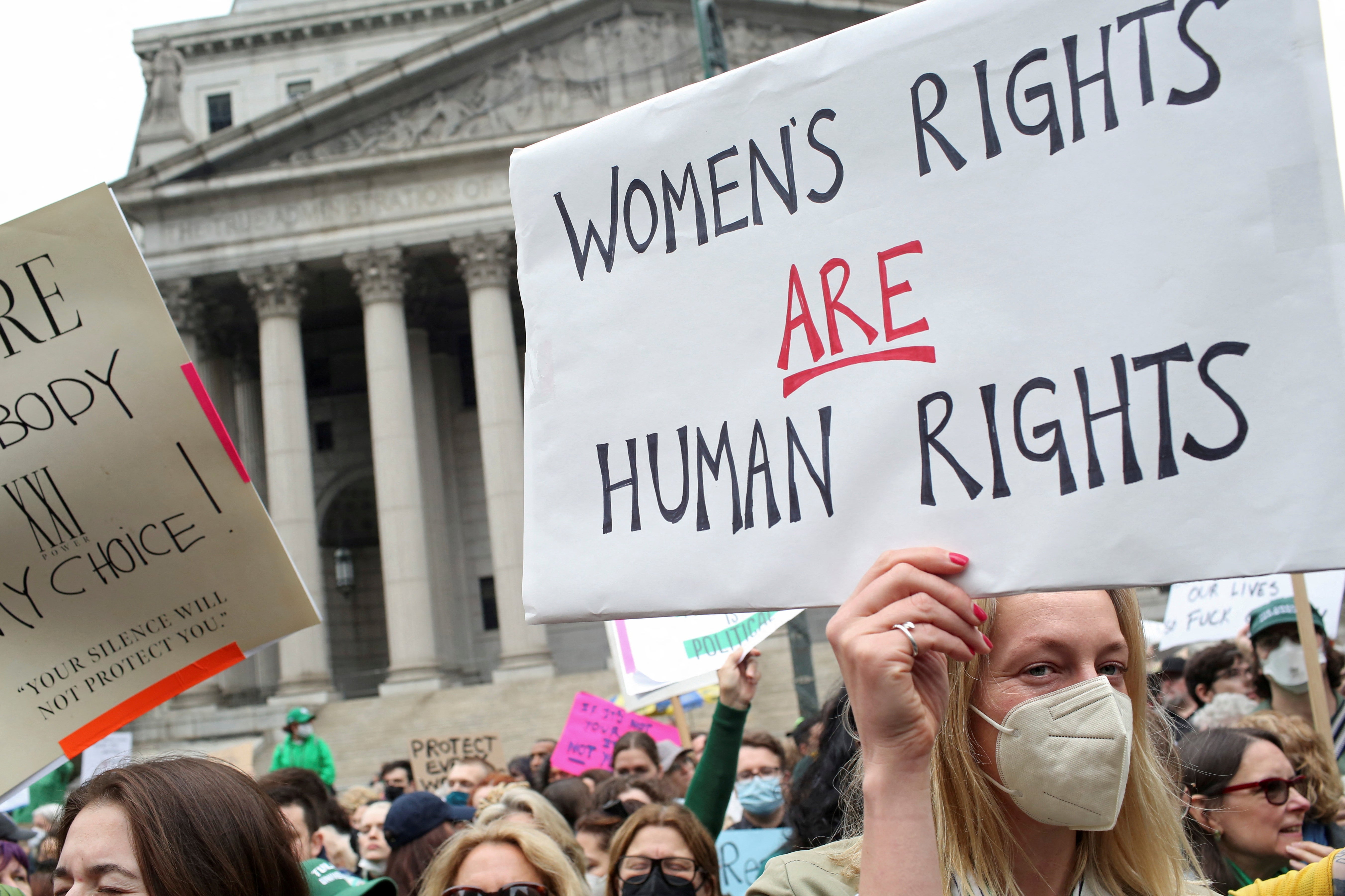 People protest after the leak of a draft majority opinion written by Justice Samuel Alito, preparing for a majority of the court to overturn the landmark Roe v Wade