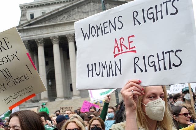 <p> People protest after the leak of a draft majority opinion written by Justice Samuel Alito, preparing for a majority of the court to overturn the landmark Roe v. Wade</p>